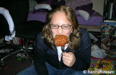 Girl.. eating a huge meatball