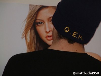 Guy licking a poster