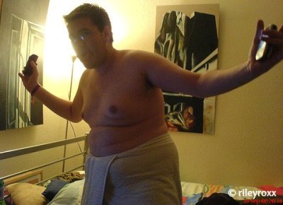 Man posing only in towel