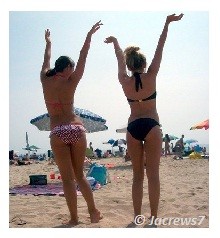 Girls fooling around at a beach