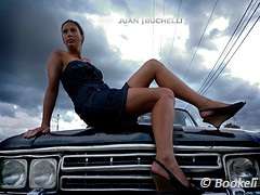 girl sitting on a car bonnet