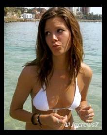 Beautiful Girl Opening her Bikini lace