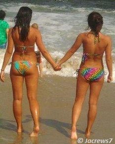 Beautiful Bikini Girls holding each other's hands