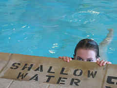 Adult Pool Party Games A girl in shallow Water