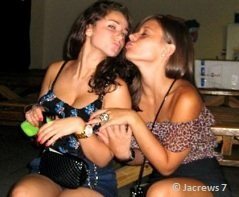 girls posing for a kiss