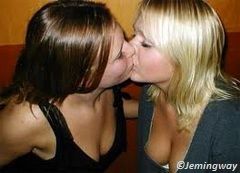 Girls kissing in sexy outfits
