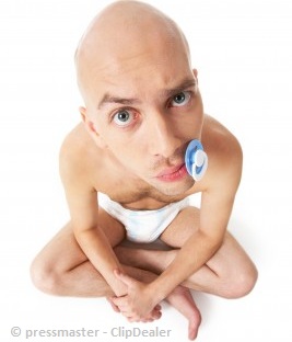 Bald guy acting like a baby with a soother in his mouth