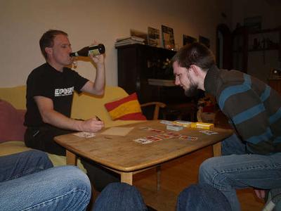 Friends Drinking and Playing Card Games