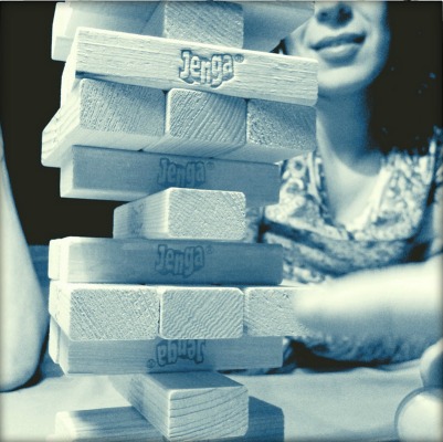Girl playing truth or dare jenga