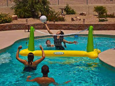 Playing Pool Volleyball at your private pool party