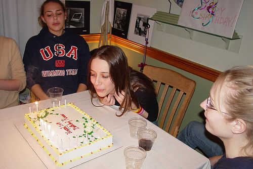 irl blowing out the birthday cake candles