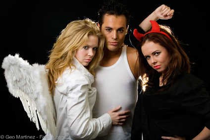 Two hot girls one blonde angel and one brunette devil with man - choosing between Truth or Dare