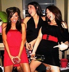 Girls fooling around with bottle