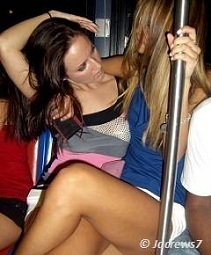 Blonde girl doing pole lap dance
