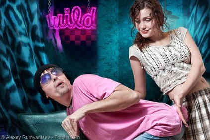 Beautiful girl spanking a guy