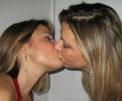 girl kissing girl to practice their first kiss