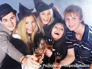 A group of young girls and guys having drinks
